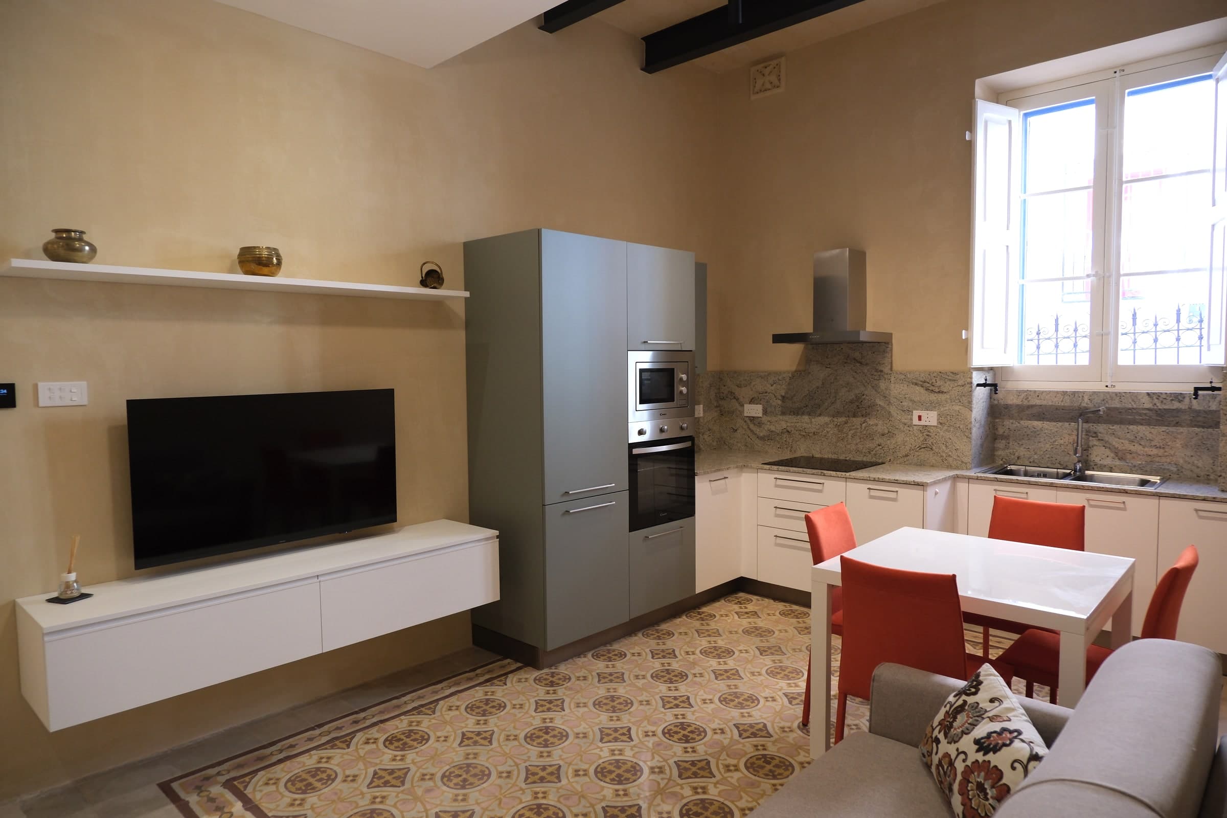Kitchen, dining, and living area at Casa Maria Goretti