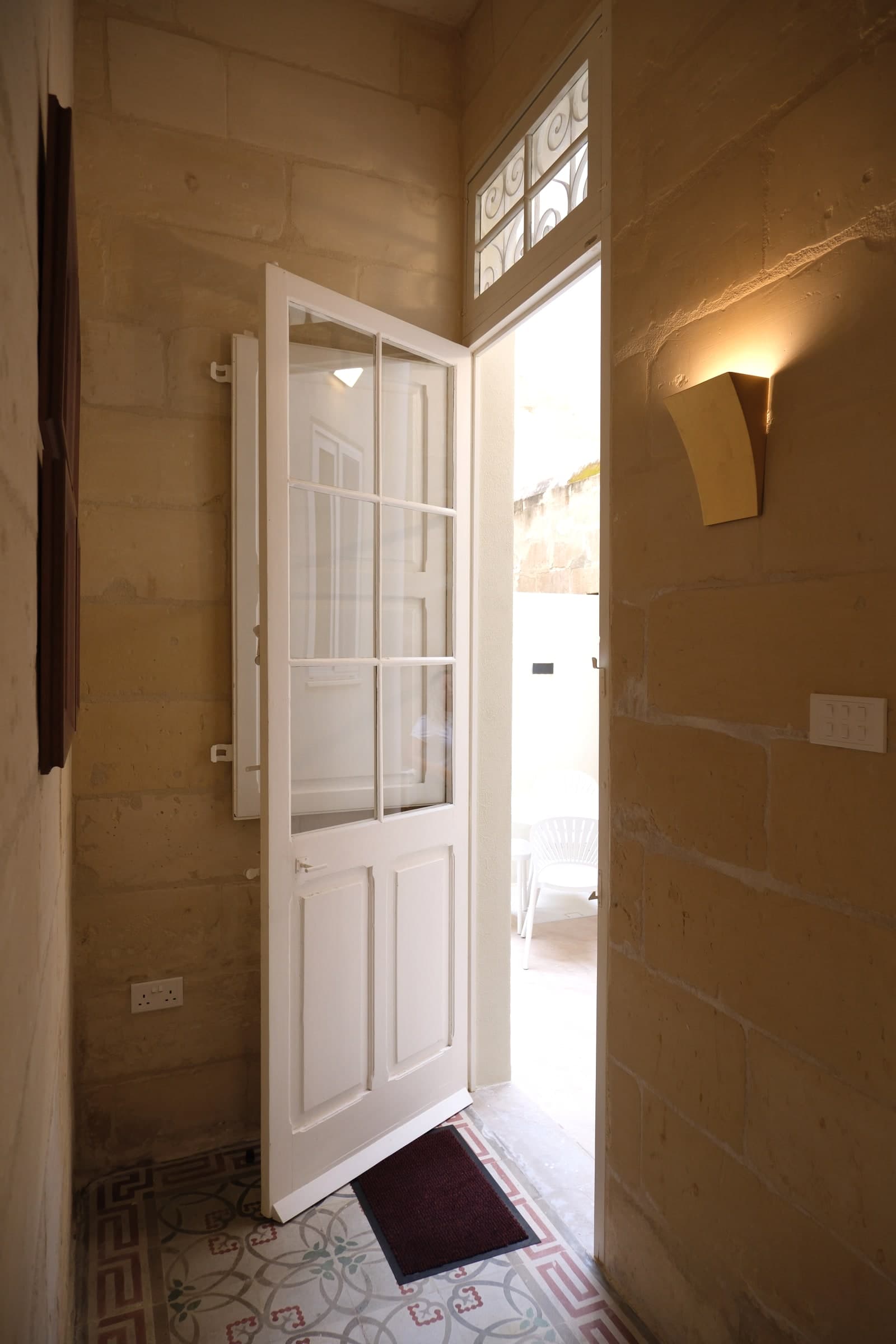 Casa Maria Goretti doorway leading to the private yard